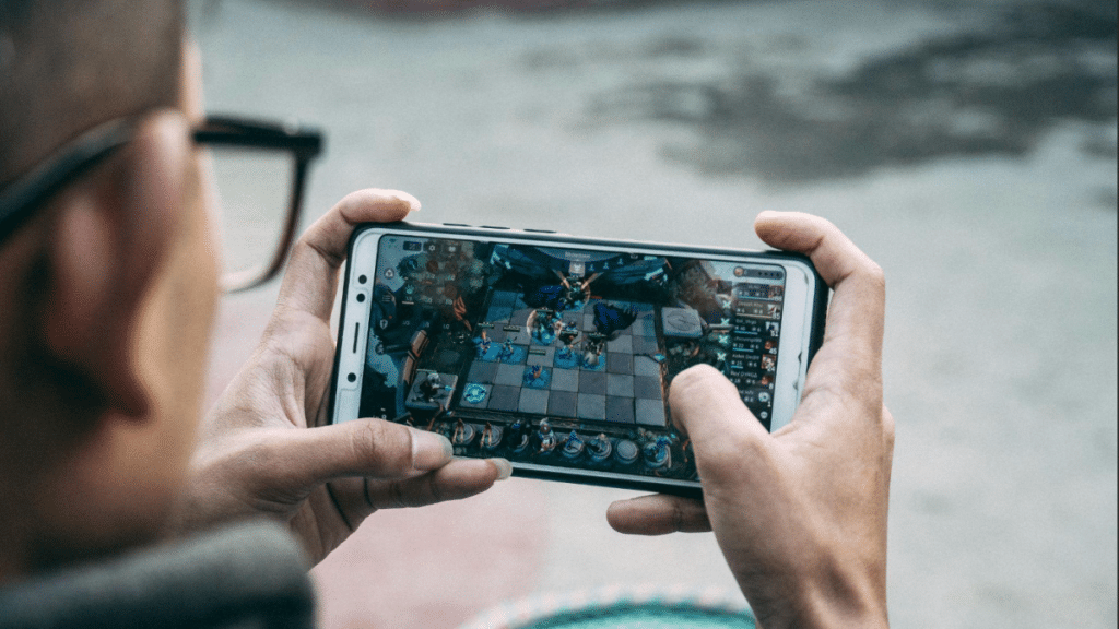 A person gaming on a phone.