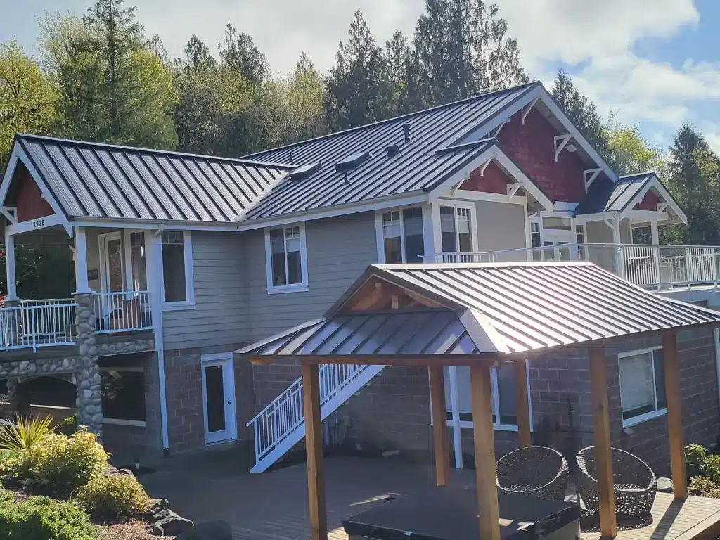 Black standing seam metal roof on a home in Olympia, Washington