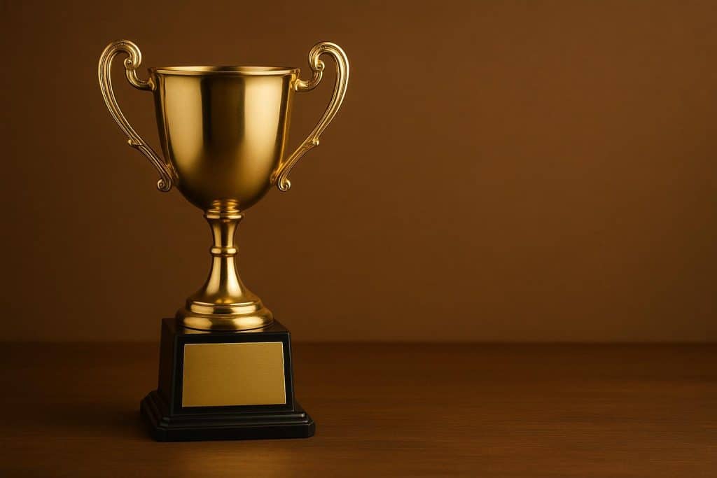 Gold engraved trophy with customizable inscription plate for award inspiration and ideas