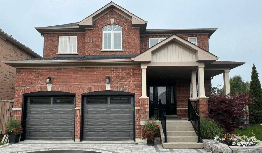 Upgrade Your Home Exterior with New Front Doors Patio Doors and Garage Doors in Canada 2026 Modern Canadian home exterior with stylish front door, patio door, and garage door upgrades